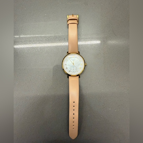Gold and Tan Watch

Never worn